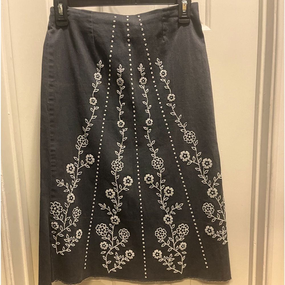 Charcoal skirt with white beading.